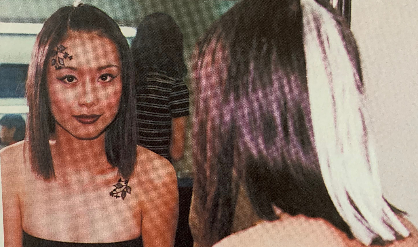ann kok face tattoo