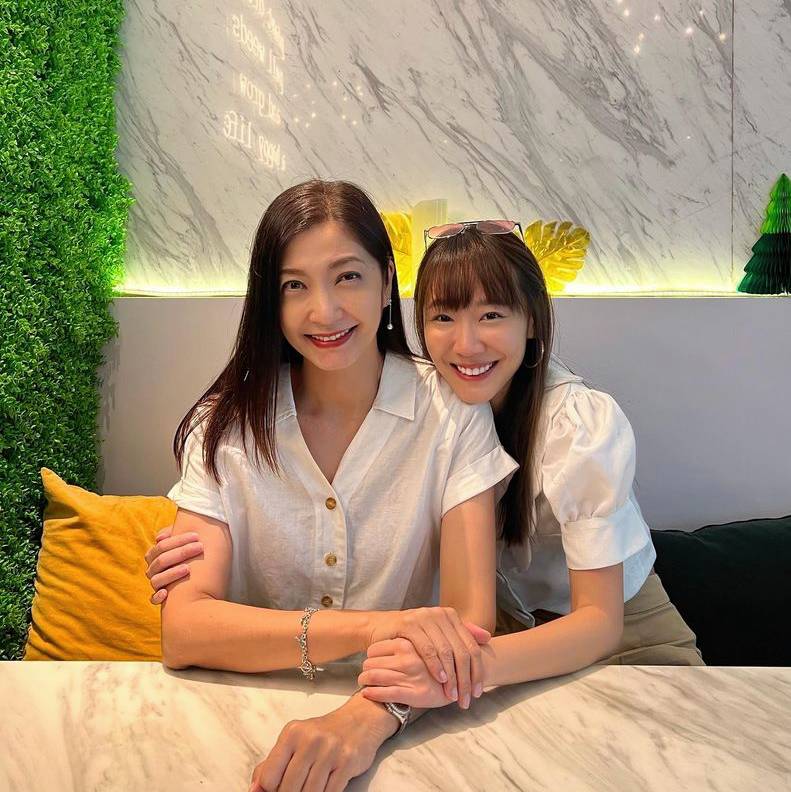 Huang Biren and Julie Tan caught up with each other