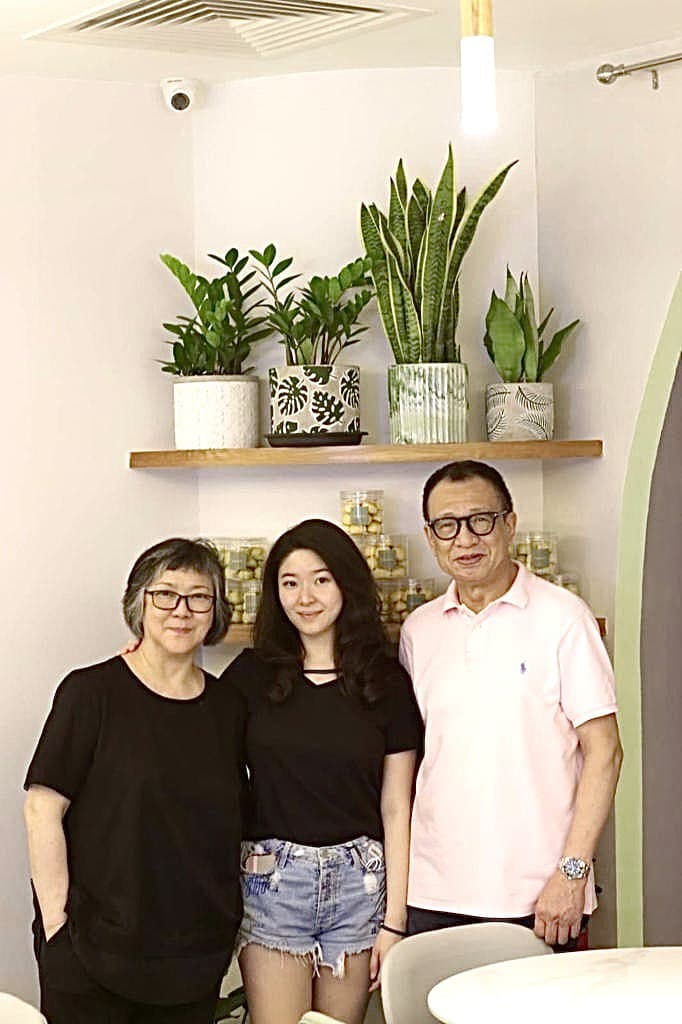 Charmaine with her parents