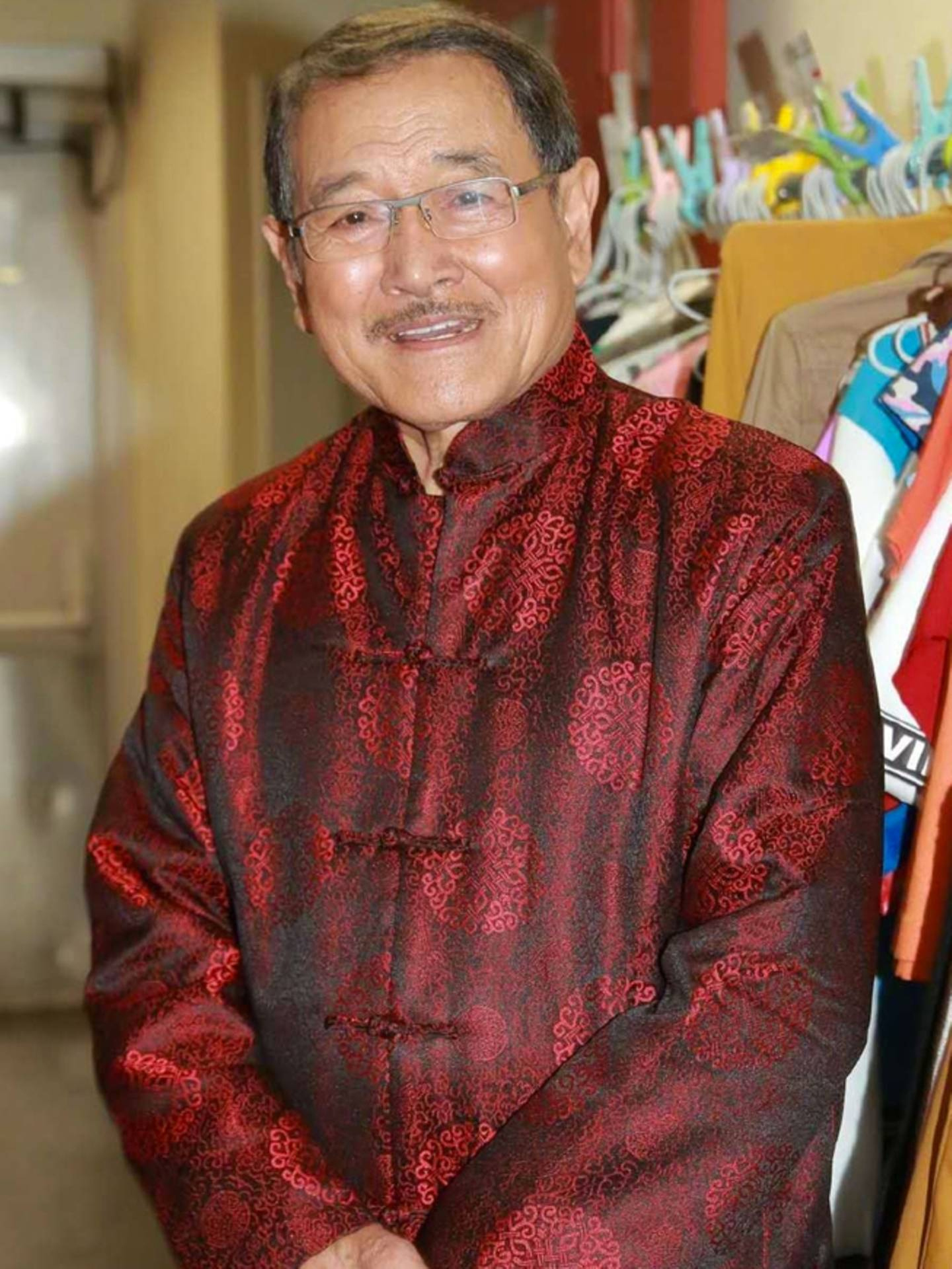 Lau Dan is more than happy to be his son's spokesperson