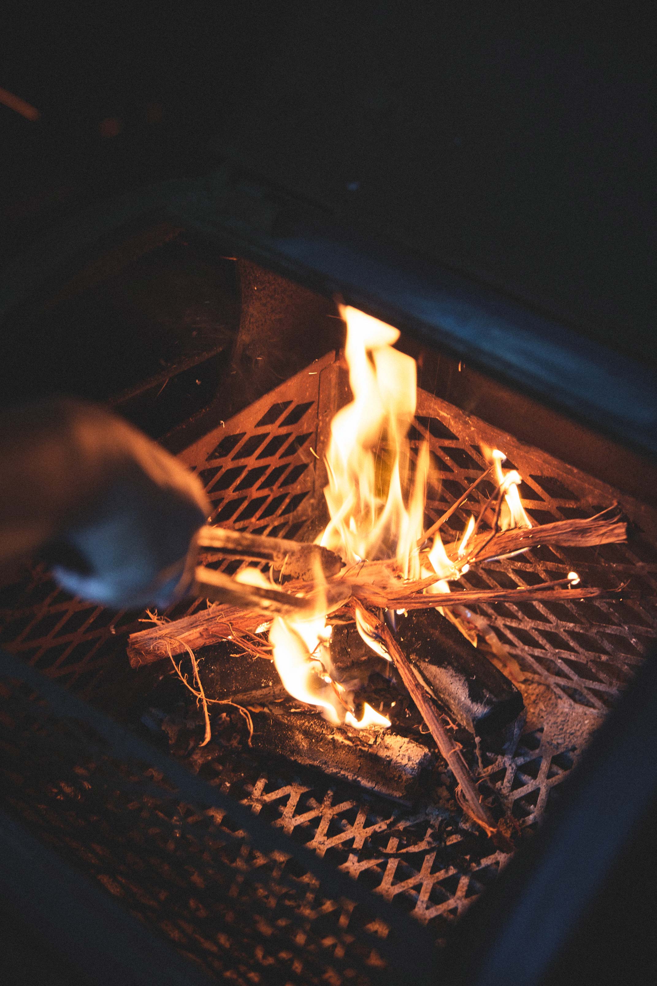 Sleeps in cramped commercial kitchen while smoking meats