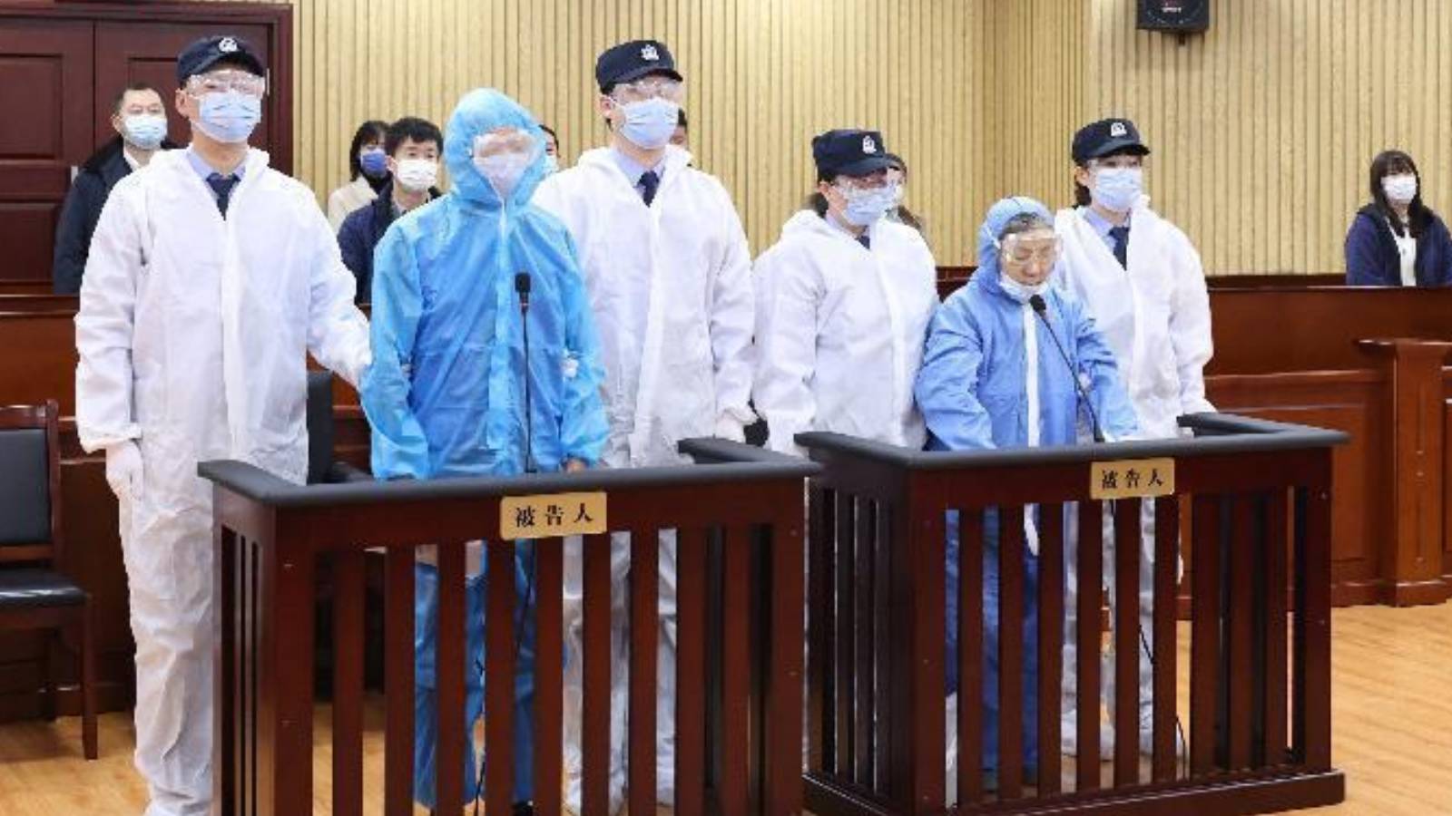 Wanting's mum (in blue PPE, on the right) during her second hearing