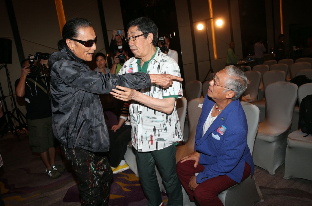 Patrick Tse, 85, and Kenneth Tsang, 86... with Wu Fung, 90, caught in the middle