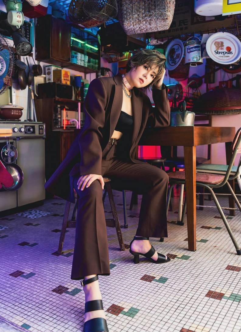 She pulls off this suit pretty well, no?