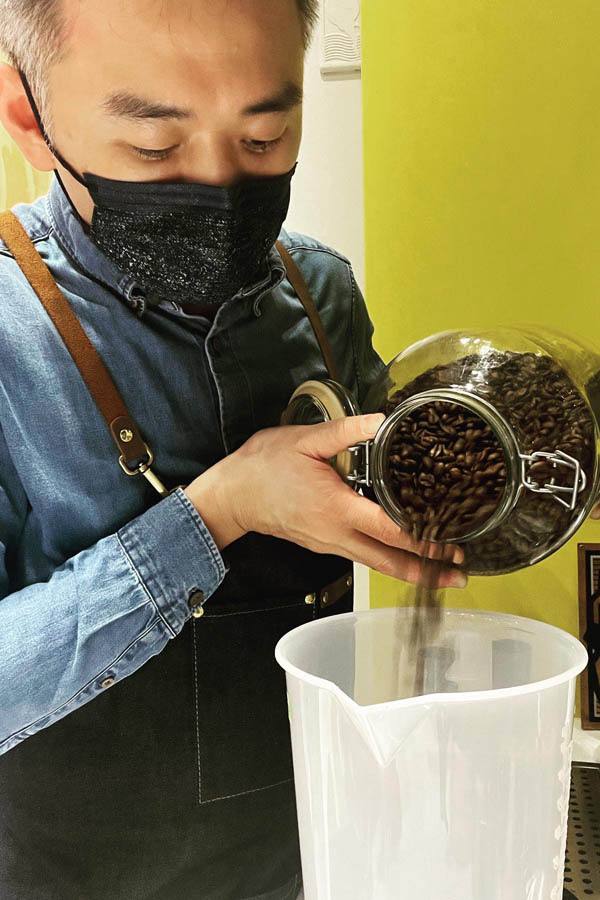 Taking his coffee business very seriously