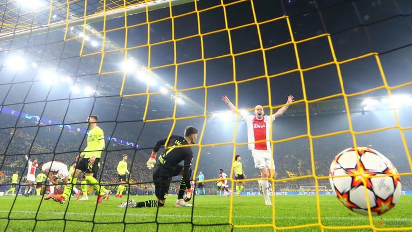 Ajax win at Dortmund to qualify for last 16 Ajax win at Dortmund to qualify for last 16