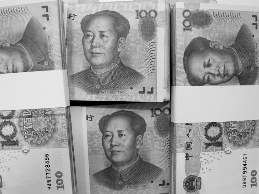 Internationalising the renminbi should be 
done gradually 
and through specific channels. 
PHOTO: BLOOMBERG