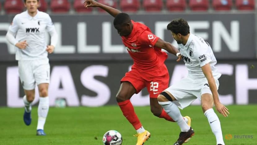 Football: Leipzig stay top with win at Augsburg, Dortmund edge past Hoffenheim Football: Leipzig stay top with win at Augsburg, Dortmund edge past Hoffenheim