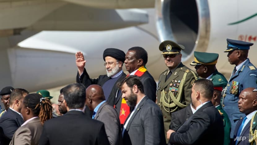 Iran's Raisi visits fellow outlier Zimbabwe ahead of key vote