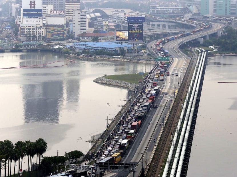 The Causeway was jammed with vehicles entering Malaysia yesterday. Photo: Wee Teck Hian