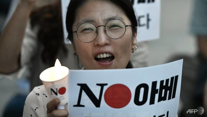 Angry South Koreans accuse Japan of 'economic invasion' Angry South Koreans accuse Japan of 'economic invasion'