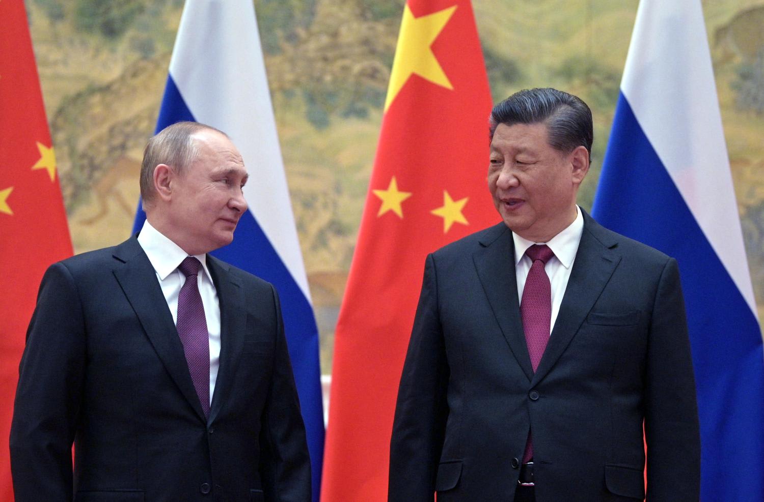 Russian President Vladimir Putin (left) and Chinese President Xi Jinping pose for a photograph during their meeting in Beijing, on Feb 4, 2022. Russian President Vladimir Putin (left) and Chinese President Xi Jinping pose for a photograph during their meeting in Beijing, on Feb 4, 2022.