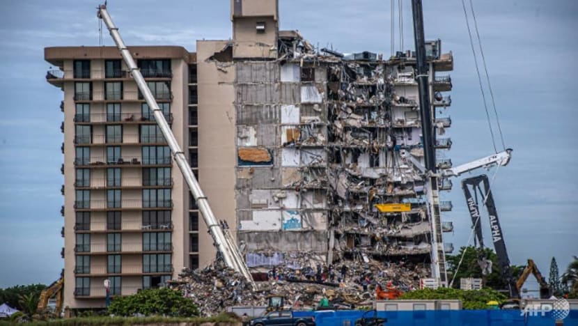 Second Florida building evacuated as death toll rises to 22 in condo tower collapse