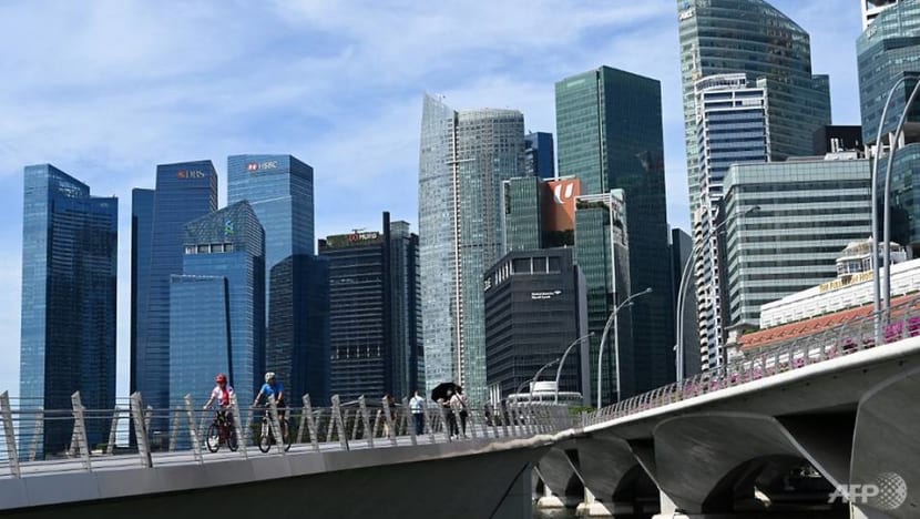 a view shows buildings in the financial district in singapore