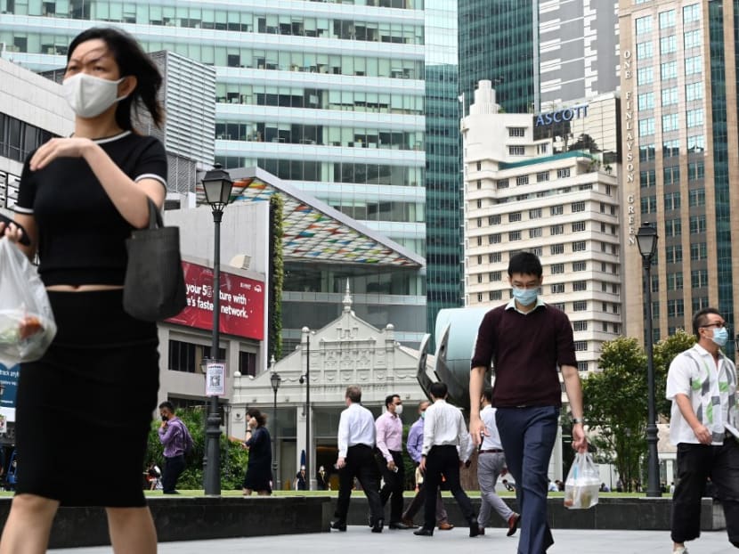 People walking during their lunch break at the financial business district of Raffles Place in Singapore on Jan 11, 2021. People walking during their lunch break at the financial business district of Raffles Place in Singapore on Jan 11, 2021.