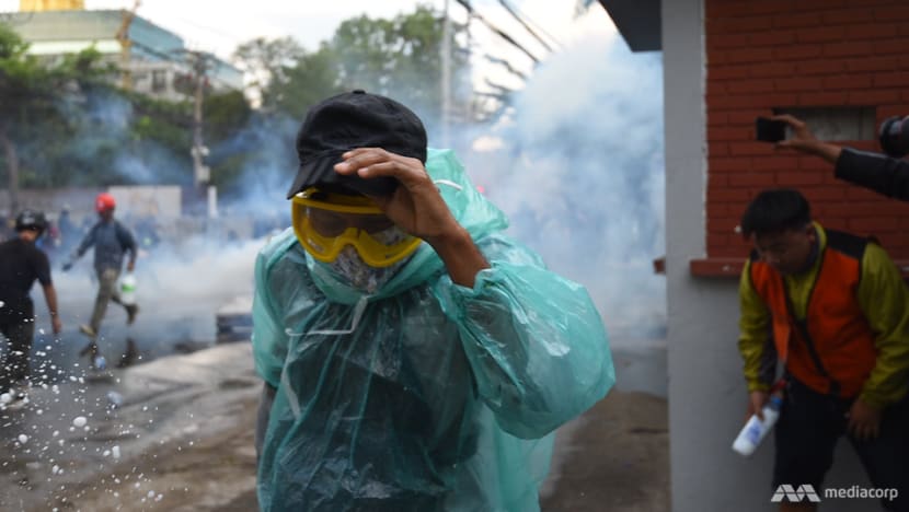 Thai police fire tear gas, water cannon at parliament protest Thai police fire tear gas, water cannon at parliament protest