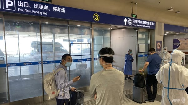 China slashes COVID-19 quarantine time for international travellers