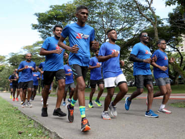 The Thaarumaaru Runners — a running group for the Indian community — on a long morning run at East Coast Park on July 31, 2022.