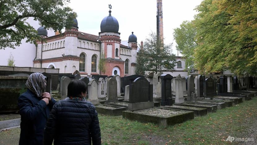 Alone before an invisible audience: German gunman lived online Alone before an invisible audience: German gunman lived online