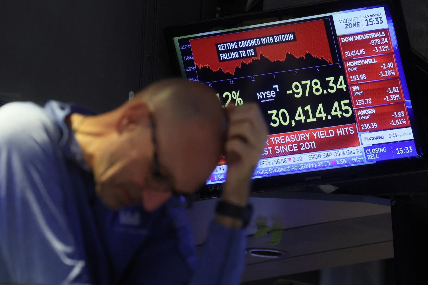 A trader works on the floor of the New York Stock Exchange (NYSE) in New York City, on June 13, 2022