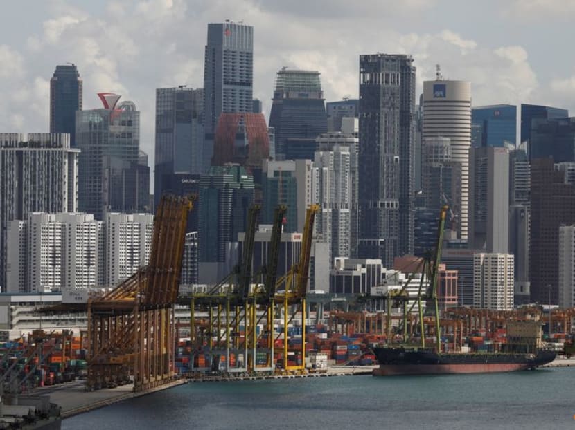 FILE PHOTO: A ship docks at Keppel terminal in Singapore November 17, 2020. REUTERS/Edgar Su/File Photo FILE PHOTO: A ship docks at Keppel terminal in Singapore November 17, 2020. REUTERS/Edgar Su/File Photo
