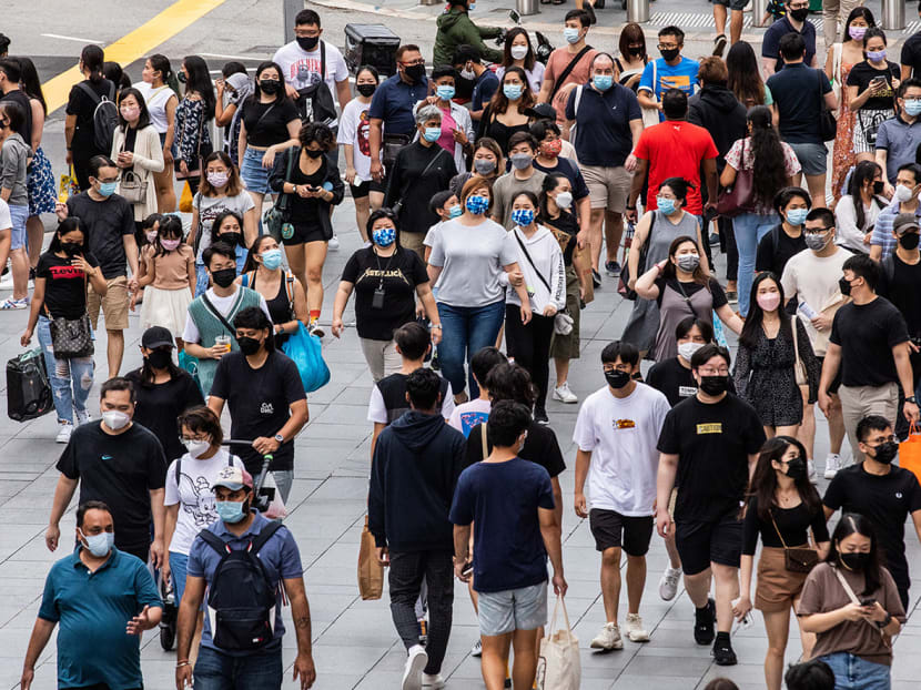 Crowds at Orchard Road in 2021. A White Paper on Singapore’s response to Covid-19 noted that the authorities’ initial position on mask-wearing could have been better handled. Crowds at Orchard Road in 2021. A White Paper on Singapore’s response to Covid-19 noted that the authorities’ initial position on mask-wearing could have been better handled.