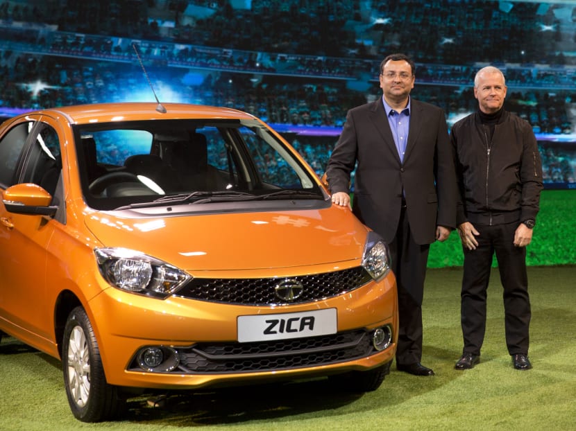 Tata Motors chairman Cyrus Mistry (second left) with Head of Tata Engineering and research and development Tim Leverton at the launch of Zica at the press preview of Auto Expo, in Greater Noida, near New Delhi, India , Feb 3, 2016. Photo: AP