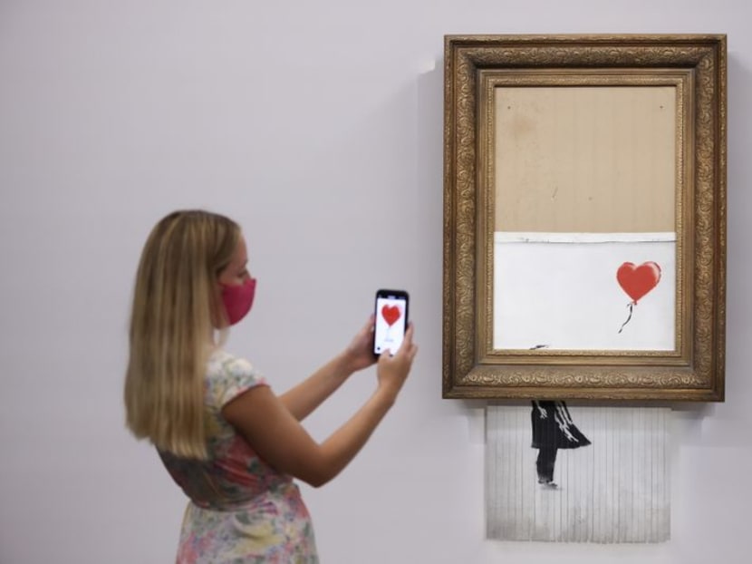 Three years on, shredded Banksy artwork returns to auction Three years on, shredded Banksy artwork returns to auction