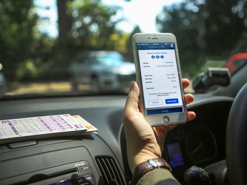 The Parking.sg app, which uses the Global Positioning System and is meant as an alternative to paper coupons, negates the need for drivers to return to their cars to replenish coupons to extend their parking sessions. Photo: MCI