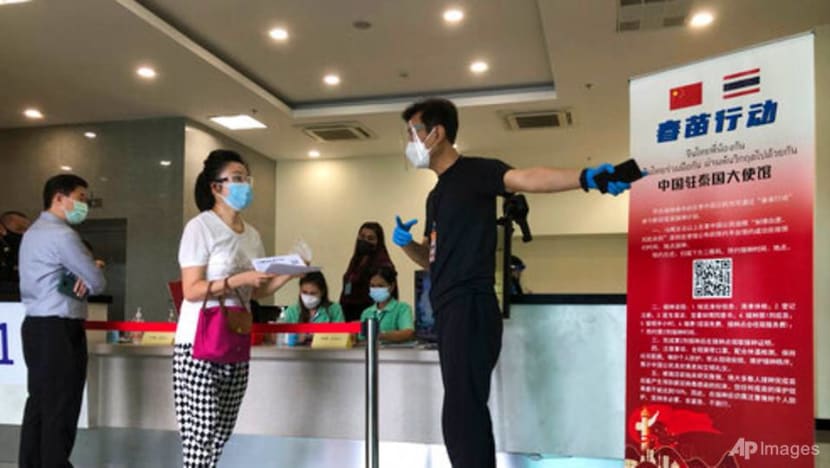China, in global campaign, vaccinates its citizens in Thailand against COVID-19 China, in global campaign, vaccinates its citizens in Thailand against COVID-19