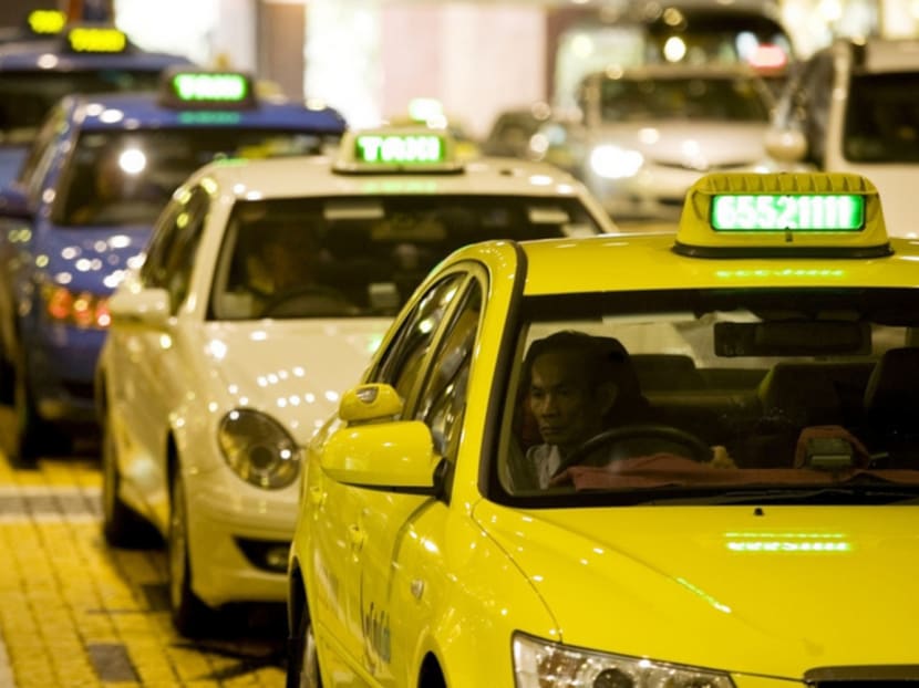 Taxi drivers should not be allowed to leave their engines running while waiting for passengers. Photo: Bloomberg
