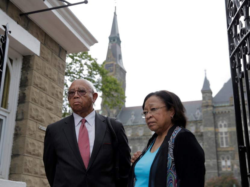 Joe Stewart and Patricia Bayonne-Johnson, both descendants of people sold as slaves by Georgetown University, arrive to hear about moves aimed at acknowledging and encouraging dialogue about the Jesuit-run university's ties to slavery in Washington, September 1, 2016.   Photo: REUTERS