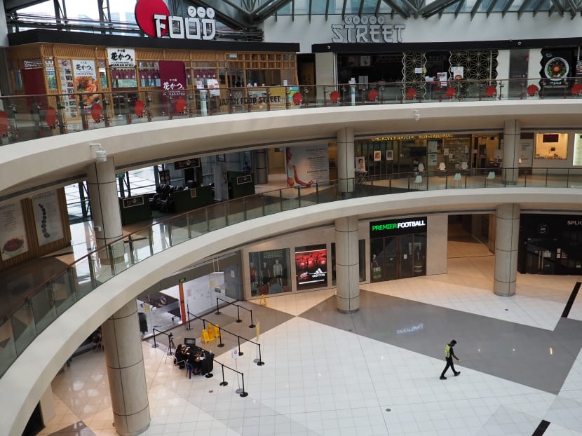 A near-empty atrium in Suntec City on May 27, 2020. Analysts expect rents in prime malls to drop by between 10 and 14 per cent for the whole of 2020.