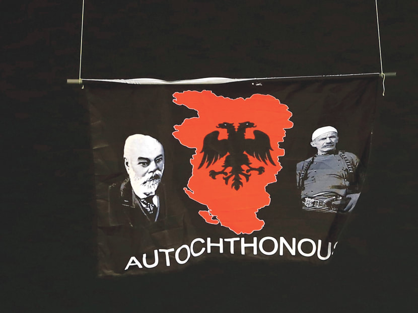 A flag depicting so-called ‘Greater Albania’ was flown over the pitch during the match yesterday. Photo: Reuters