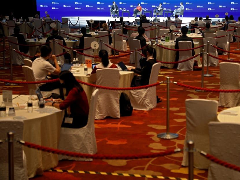 Participants at a conference held at the Marina Bay Sands Convention Centre in Singapore in January 2021. Participants at a conference held at the Marina Bay Sands Convention Centre in Singapore in January 2021.