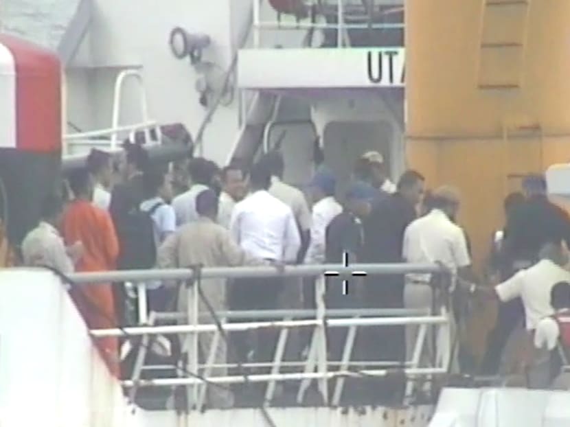 Johor Menteri Besar Osman Sapian and his entourage transferred onto Malaysia Marine Department (MMD) vessel Pedoman.