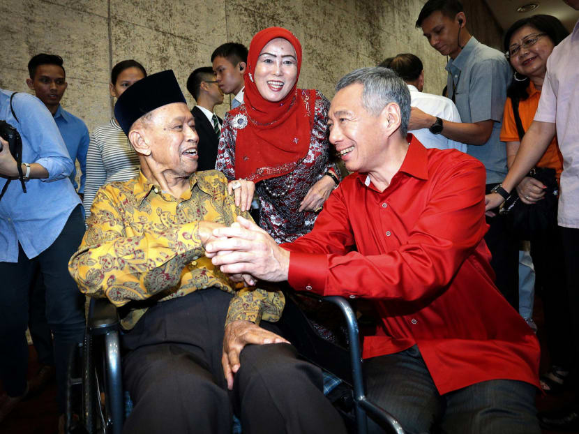 PM Lee Hsien Loong with Othman Wok at the National Day Rally on August 23, 2015. Photo: Jason Quah/TODAY