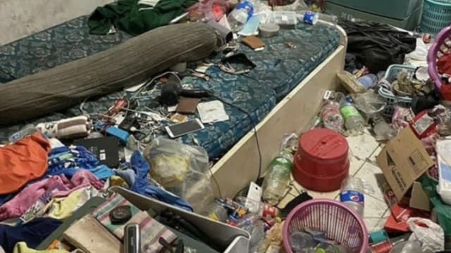 泰国公寓门缝流出水 管理员开门惊见垃圾堆