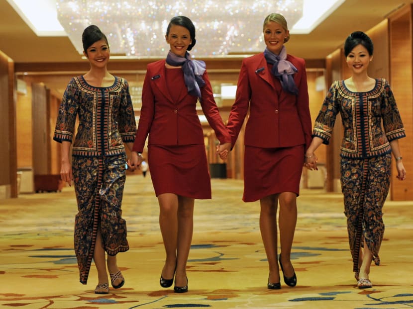 Stewardesses from Singapore Airlines and Virgin Australia. AFP file photo
