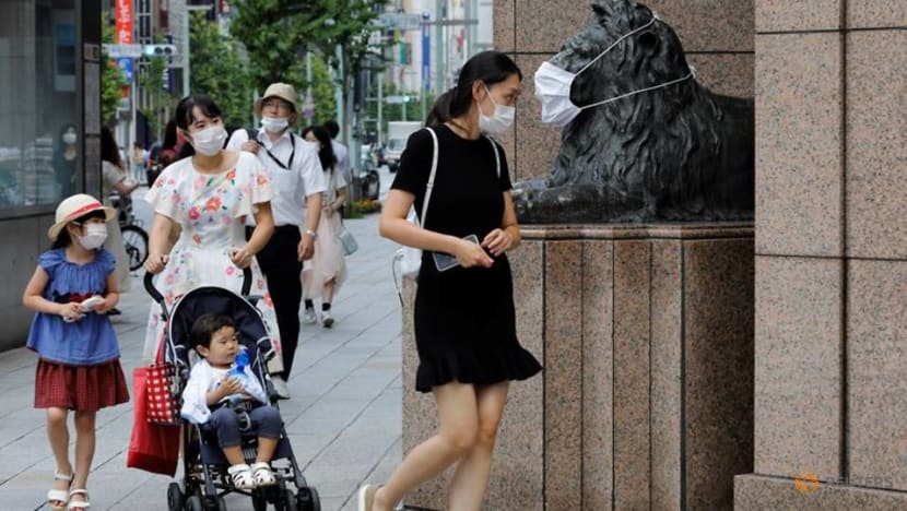 Tokyo lowers alert level as COVID-19 fears ease Tokyo lowers alert level as COVID-19 fears ease