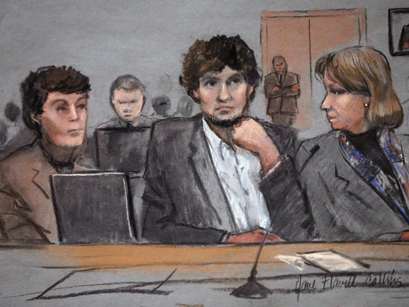 In this courtroom sketch, Dzhokhar Tsarnaev, centre, is depicted between defence attorneys Miriam Conrad, left, and Judy Clarke, right, during his federal death penalty trial on Thursday, March 5, 2015, in Boston. Photo: AP