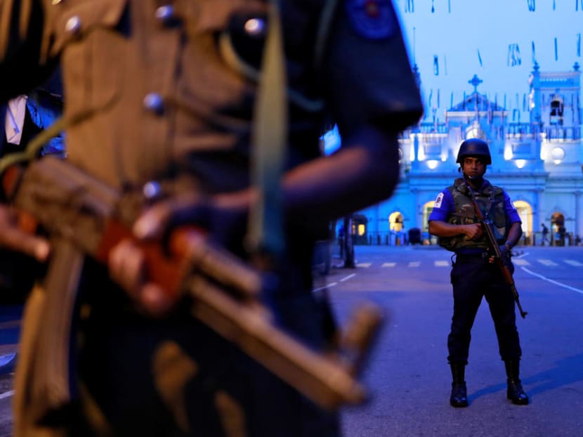 Security personnel stand guard in front of St Anthony's Shrine, days after a string of suicide bomb attacks across Sri Lanka on Easter Sunday 2019.