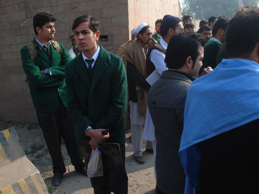 Gallery: Taliban attack Pakistani school, kill at least 84