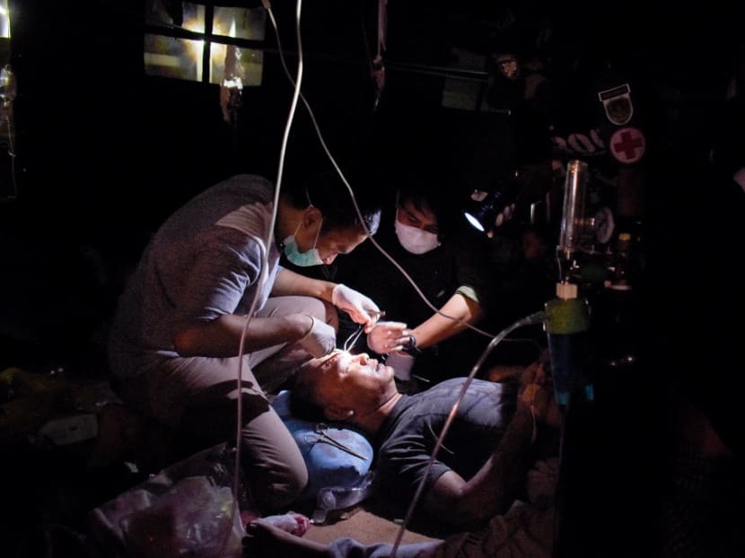 Wounded survivors of an earthquake are being treated in the yard of a hospital in Cianjur on Nov 21, 2022. Wounded survivors of an earthquake are being treated in the yard of a hospital in Cianjur on Nov 21, 2022.