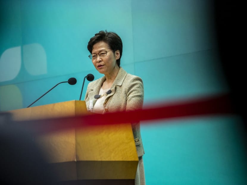 Hong Kong leader Carrie Lam defends US bank head Covid-19 quarantine exemption