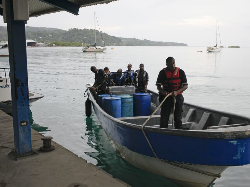 Members of Jamaica's Marine Police return to port after leaving the site where it is presumed a small US private plane with an unresponsive pilot crashed off the east coast of Jamaica, in Port Antonio Sept 5, 2014.  Photo: Reuters
