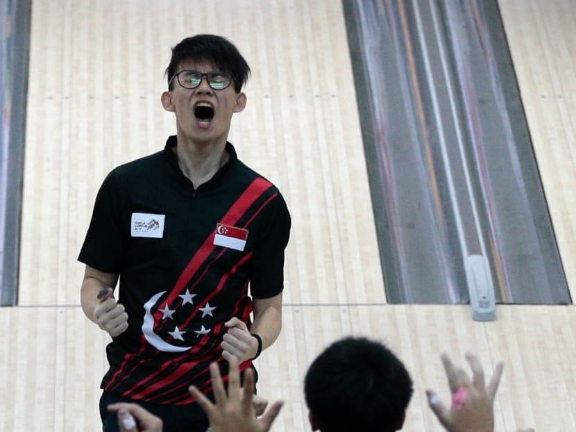 Singapore's Basil Ng reacts as he competes in the SEA Games men's bowling team of five on August 24, 2017. Photo: Jason Quah