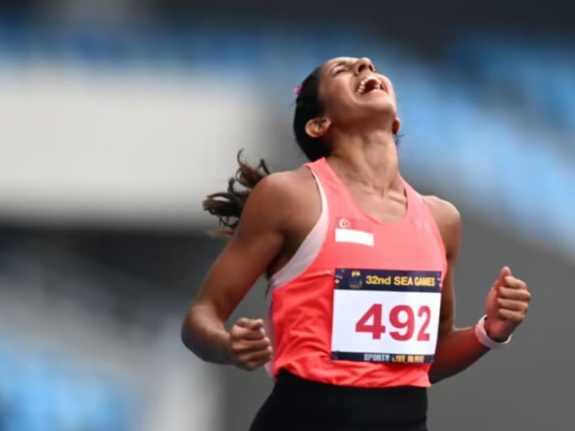 Singaporean sprinter Shanti Pereira celebrates winning the women's 200m final at the 32nd Southeast Asian (SEA) Games on May 8, 2023.