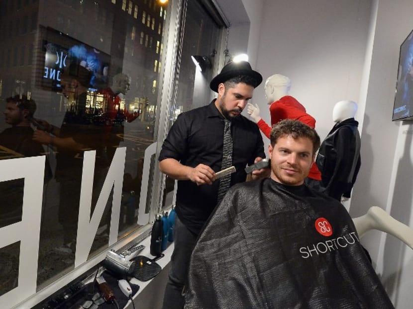 Getting a haircut in New York. Photo: AFP