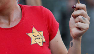 Israel sees Holocaust tropes in COVID-19 protests fuelling anti-Semitism 